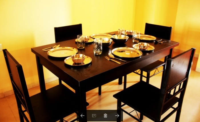 Rishab's Nest 3 BHK Apartment dining table