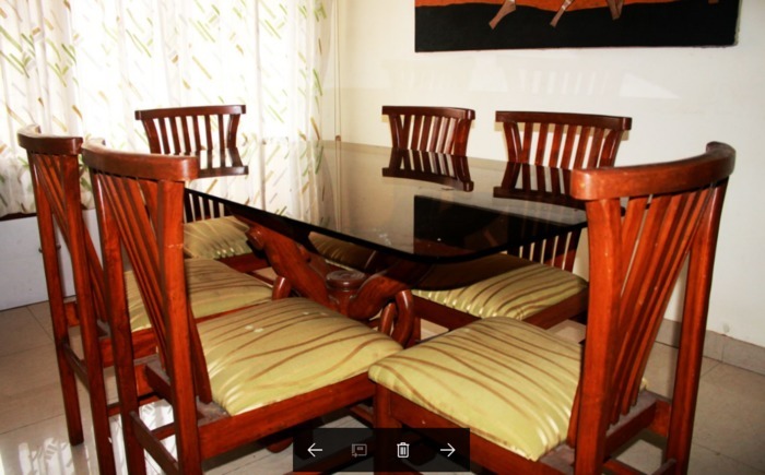 Subhash's Nest 3 BHK Apartment Dining table