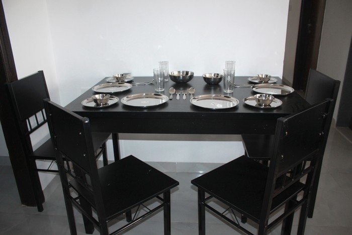 Kalpana's Nest 3 BHK Apartment Dining table